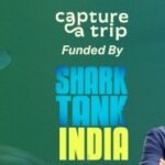 Capture a Trip in Shark Tank Logo
